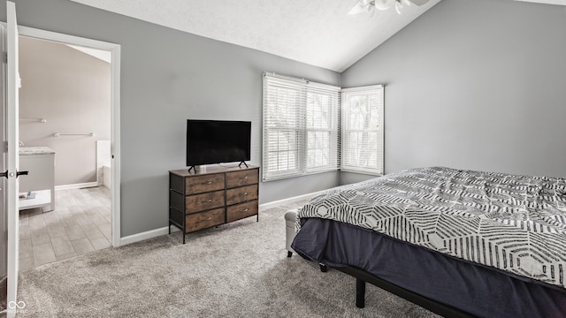 12861 Clifford Cir, Carmel, IN 46032 - bedroom featuring carpet, vaulted ceiling, and ensuite bathroom