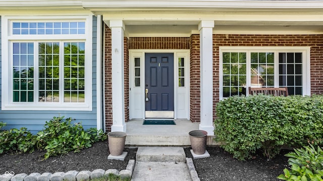 12861 Clifford Cir, Carmel, IN 46032 - view of exterior entry featuring brick siding