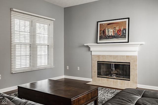12861 Clifford Cir, Carmel, IN 46032 - living room featuring a fireplace and wood finished floors