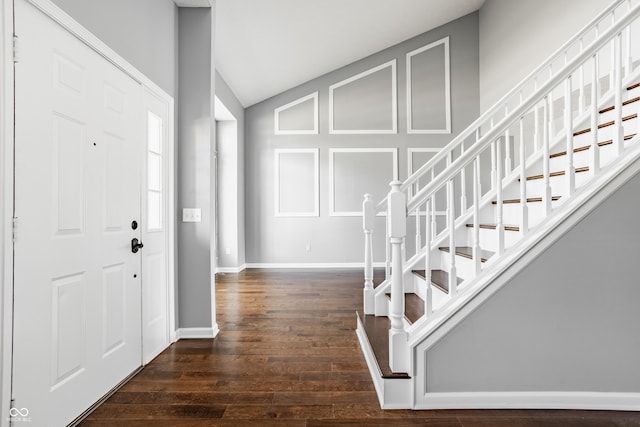 12861 Clifford Cir, Carmel, IN 46032 - foyer featuring dark wood-style flooring, lofted ceiling, and stairway