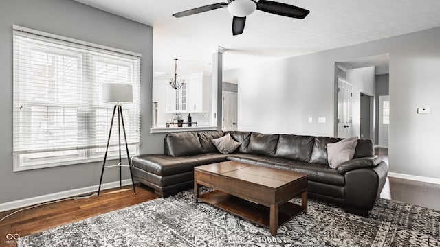 12861 Clifford Cir, Carmel, IN 46032 - living room with wood finished floors, ceiling fan, and healthy amount of natural light
