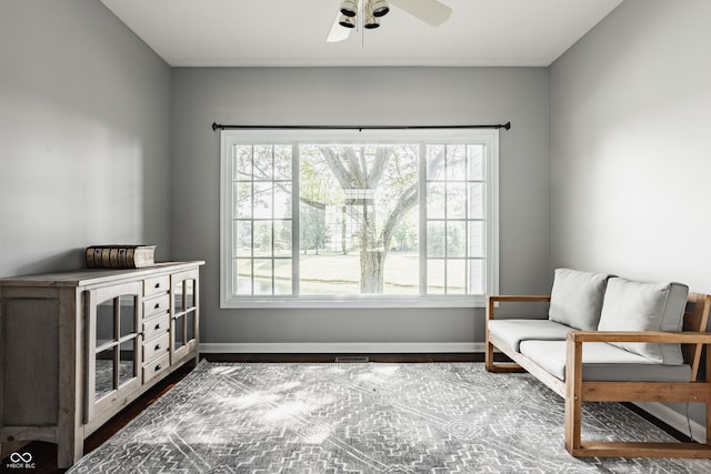 12861 Clifford Cir, Carmel, IN 46032 - sitting room featuring a ceiling fan, healthy amount of natural light, and wood finished floors