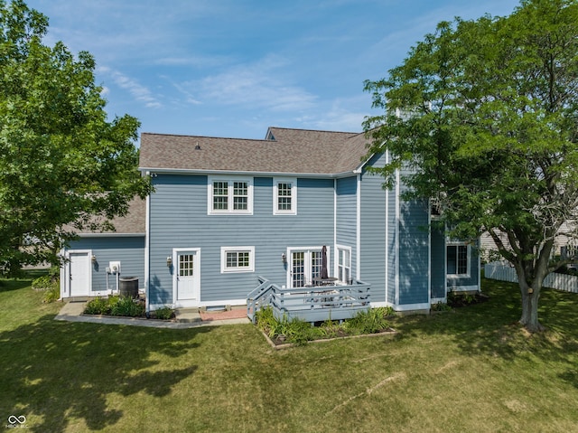 12861 Clifford Cir, Carmel, IN 46032 - rear view of house featuring a yard and a shingled roof