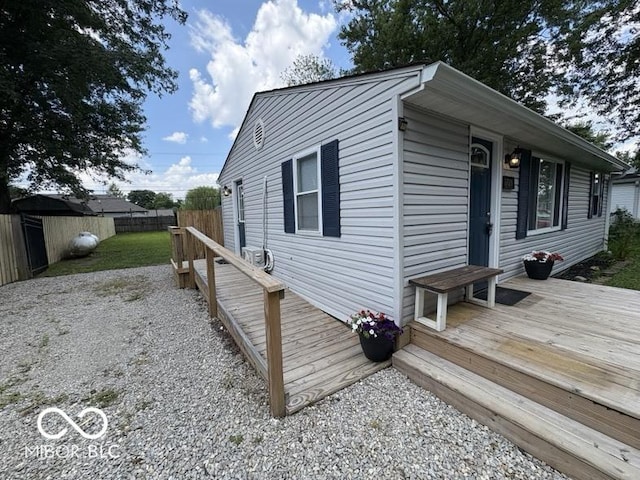 5725 N Clover Maple Dr, Fairland, IN 46126 - view of side of home featuring a wooden deck