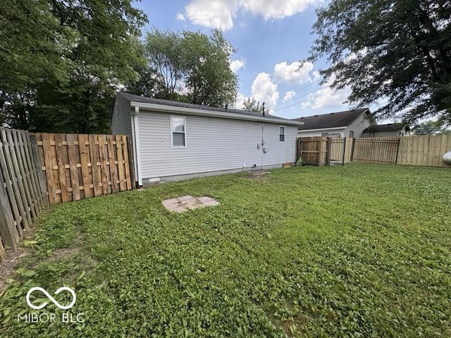 5725 N Clover Maple Dr, Fairland, IN 46126 - back of property with a fenced backyard and crawl space