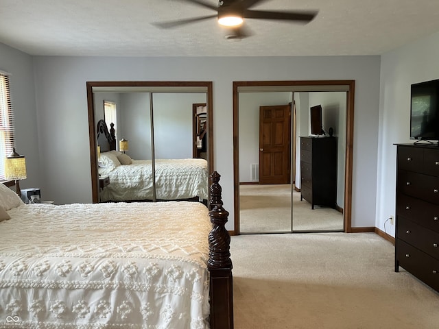 19938 State Road 37 N, Noblesville, IN 46060 - carpeted bedroom with multiple closets and a ceiling fan