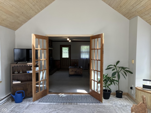 19938 State Road 37 N, Noblesville, IN 46060 - carpeted living area featuring vaulted ceiling, wood ceiling, a baseboard radiator, and french doors