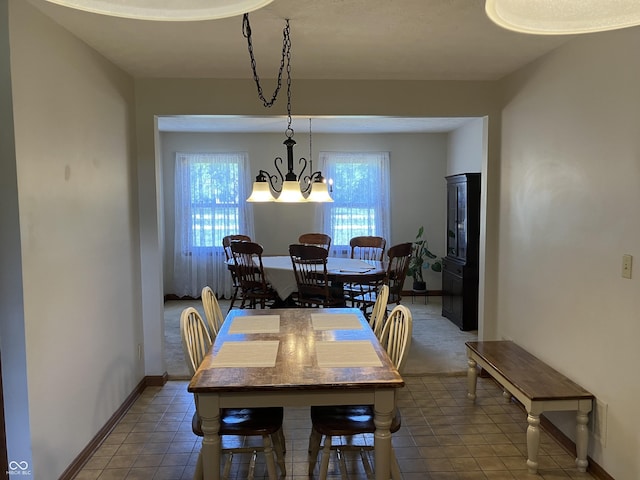 19938 State Road 37 N, Noblesville, IN 46060 - dining area featuring a chandelier and baseboards