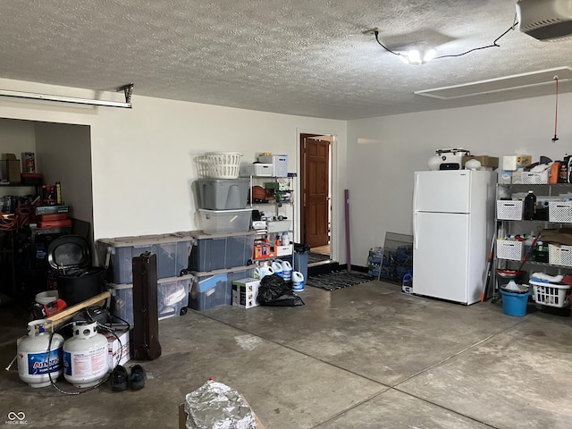 19938 State Road 37 N, Noblesville, IN 46060 - garage featuring freestanding refrigerator and a garage door opener