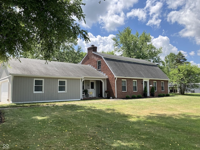 19938 State Road 37 N, Noblesville, IN 46060 - dutch colonial featuring a chimney, a front yard, roof with shingles, brick siding, and covered porch