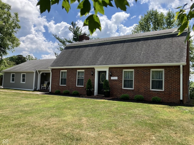 19938 State Road 37 N, Noblesville, IN 46060 - dutch colonial with a shingled roof, a chimney, brick siding, and a front lawn