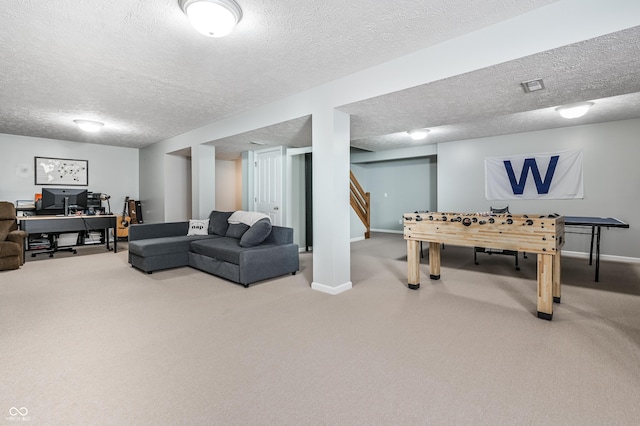 7611 Prairie Fire Ct, Brownsburg, IN 46112 - rec room with carpet flooring, a textured ceiling, and an office area