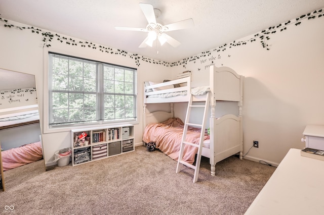 7611 Prairie Fire Ct, Brownsburg, IN 46112 - carpeted bedroom featuring ceiling fan and a textured ceiling