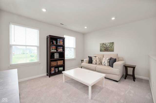 12888 Girvan Way, Fishers, IN 46037 - living room featuring plenty of natural light, light colored carpet, and recessed lighting