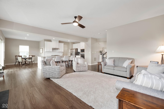 12888 Girvan Way, Fishers, IN 46037 - living area with a ceiling fan, dark wood-type flooring, and recessed lighting