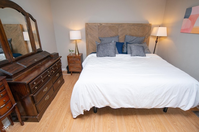 6118 Thrushwood Cir, Indianapolis, IN 46250 - bedroom with light wood-type flooring