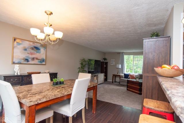 6118 Thrushwood Cir, Indianapolis, IN 46250 - dining area with a chandelier, dark wood-type flooring, and a textured ceiling