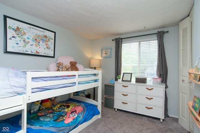 6118 Thrushwood Cir, Indianapolis, IN 46250 - carpeted bedroom with a textured ceiling