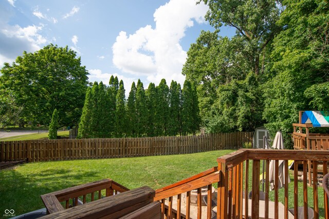 6118 Thrushwood Cir, Indianapolis, IN 46250 - fenced backyard featuring a shed and a deck