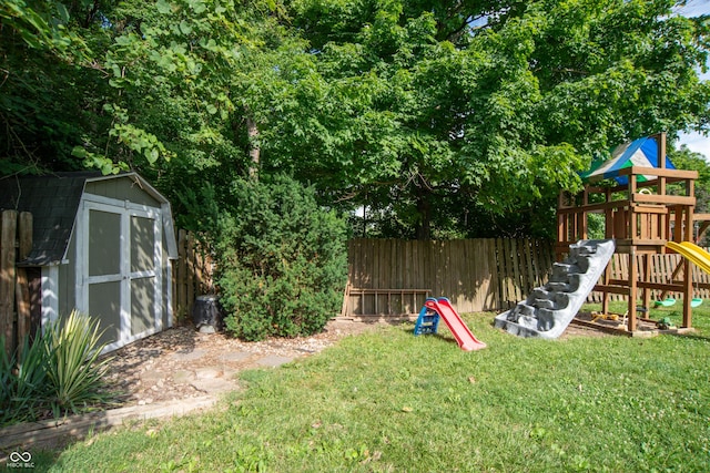 6118 Thrushwood Cir, Indianapolis, IN 46250 - view of yard with a shed and a playground