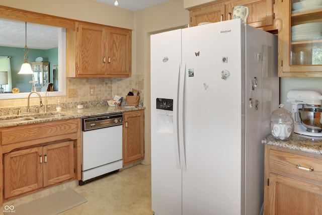 6880 S 850 E, Zionsville, IN 46077 - kitchen featuring white appliances, tasteful backsplash, light stone counters, and hanging light fixtures