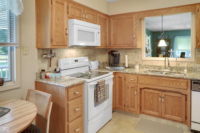 6880 S 850 E, Zionsville, IN 46077 - kitchen with white appliances, tasteful backsplash, and light stone countertops