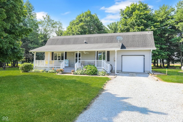 6880 S 850 E, Zionsville, IN 46077 - view of front facade with an attached garage, covered porch, gravel driveway, a front lawn, and roof with shingles