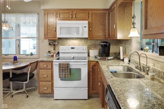 6880 S 850 E, Zionsville, IN 46077 - kitchen with white appliances, brown cabinetry, backsplash, and light stone counters