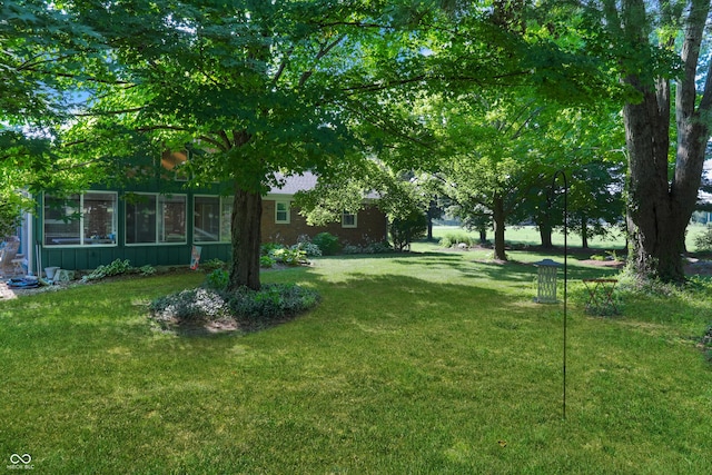 6880 S 850 E, Zionsville, IN 46077 - view of grassy yard with a sunroom