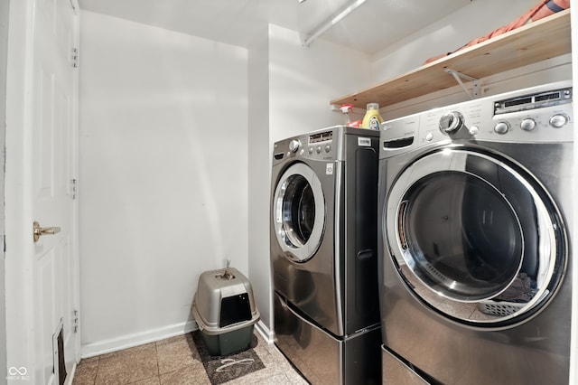 8321 Giroud Way, Indianapolis, IN 46259 - laundry room featuring washer and clothes dryer and baseboards