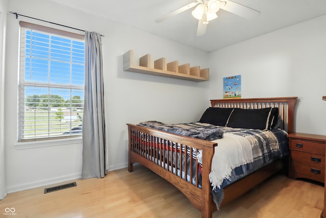 8321 Giroud Way, Indianapolis, IN 46259 - bedroom featuring light wood finished floors and ceiling fan