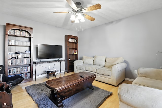 8321 Giroud Way, Indianapolis, IN 46259 - living room with ceiling fan, wood finished floors, and radiator heating unit
