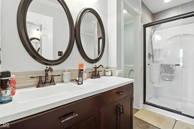8321 Giroud Way, Indianapolis, IN 46259 - full bathroom with a shower stall, double vanity, tile patterned floors, crown molding, and wainscoting