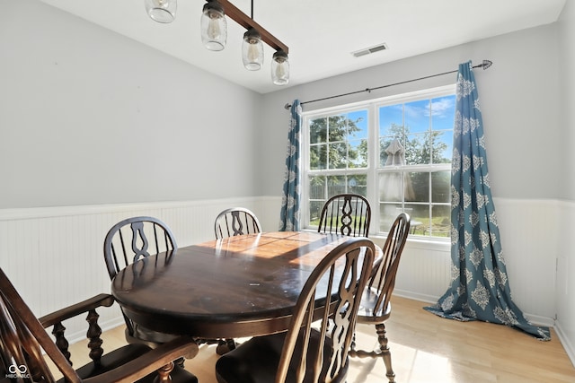8321 Giroud Way, Indianapolis, IN 46259 - dining space with wainscoting and light wood-type flooring
