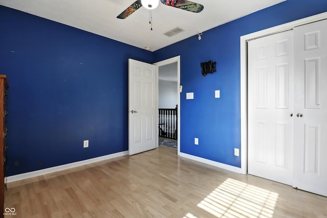 8321 Giroud Way, Indianapolis, IN 46259 - unfurnished bedroom featuring wood finished floors and a closet