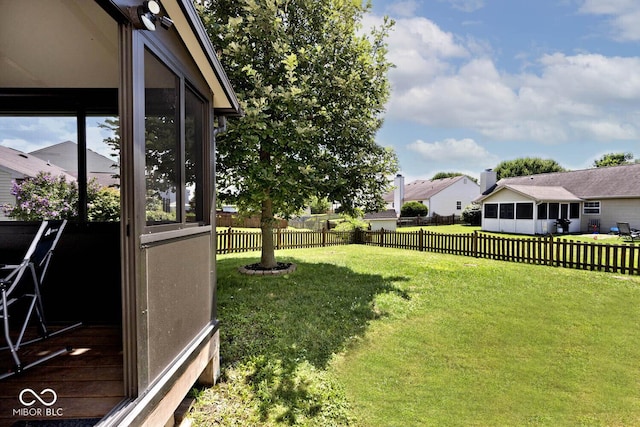 1093 Springwater Dr, Greenwood, IN 46143 - view of yard featuring a sunroom and a residential view