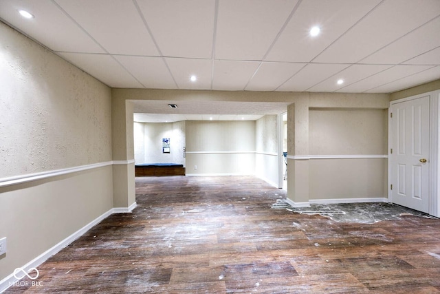 1093 Springwater Dr, Greenwood, IN 46143 - empty room featuring wood finished floors, recessed lighting, a paneled ceiling, and a textured wall