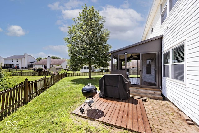 1093 Springwater Dr, Greenwood, IN 46143 - fenced backyard featuring ceiling fan, a sunroom, entry steps, a residential view, and a wooden deck