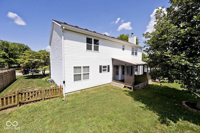 1093 Springwater Dr, Greenwood, IN 46143 - rear view of house with a chimney