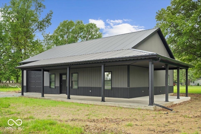 8237 S 100 E, Markleville, IN 46056 - rear view of property with a metal roof and a patio area