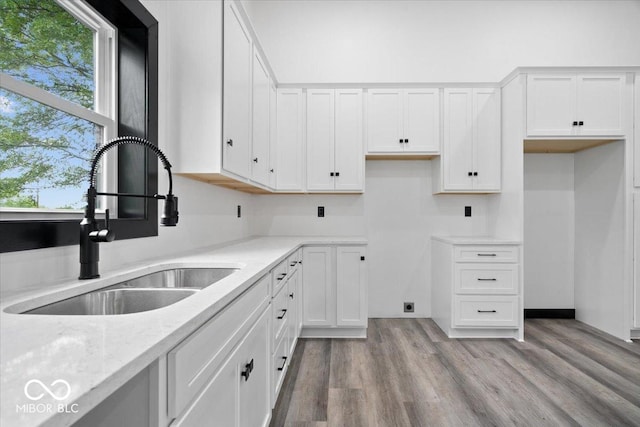 8237 S 100 E, Markleville, IN 46056 - kitchen with white cabinetry, light wood-style flooring, and light stone counters