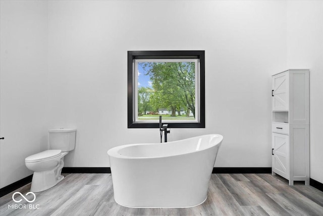 8237 S 100 E, Markleville, IN 46056 - full bathroom with a soaking tub and wood finished floors