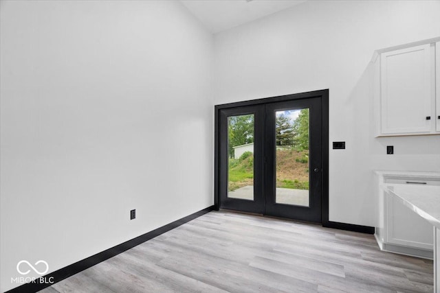 8237 S 100 E, Markleville, IN 46056 - doorway to outside with light wood-style flooring and a towering ceiling