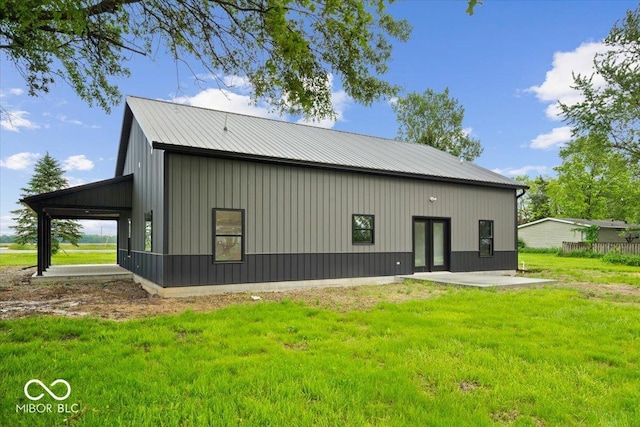 8237 S 100 E, Markleville, IN 46056 - rear view of house with a lawn, a patio area, and a metal roof