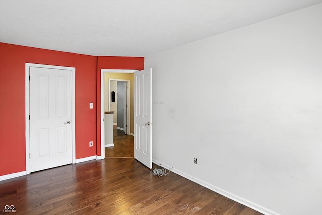 12316 Winding Creek Cir, Indianapolis, IN 46236 - unfurnished bedroom featuring hardwood / wood-style floors and baseboards