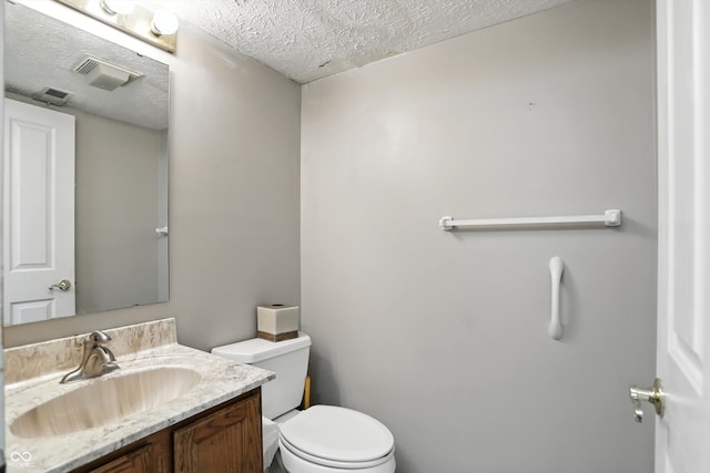12316 Winding Creek Cir, Indianapolis, IN 46236 - bathroom featuring vanity and a textured ceiling