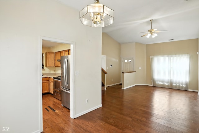 12316 Winding Creek Cir, Indianapolis, IN 46236 - kitchen featuring stainless steel appliances, a ceiling fan, brown cabinetry, open floor plan, and dark wood-style flooring