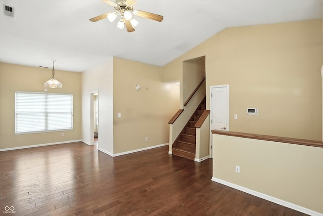 12316 Winding Creek Cir, Indianapolis, IN 46236 - empty room with a ceiling fan, lofted ceiling, dark wood-style floors, and stairs