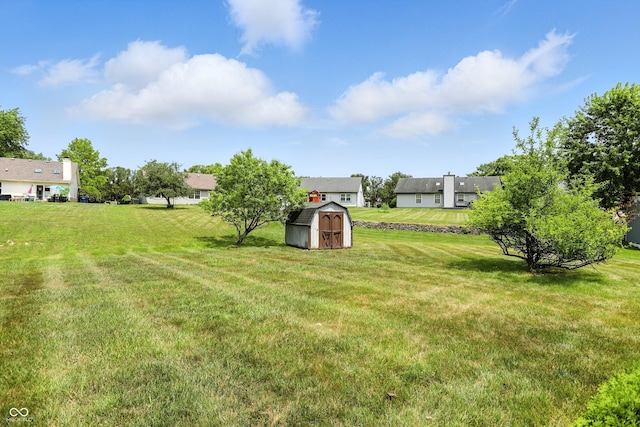 12316 Winding Creek Cir, Indianapolis, IN 46236 - view of grassy yard featuring a storage unit