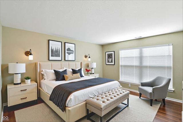 12316 Winding Creek Cir, Indianapolis, IN 46236 - bedroom featuring dark wood-type flooring and baseboards